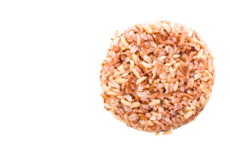 Brown rice isolated on white backgroundの写真素材