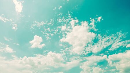 Vintage cloud on blue sky - vintage filter effectの写真素材