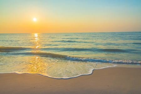 Sunrise on the beach - vintage filterの写真素材