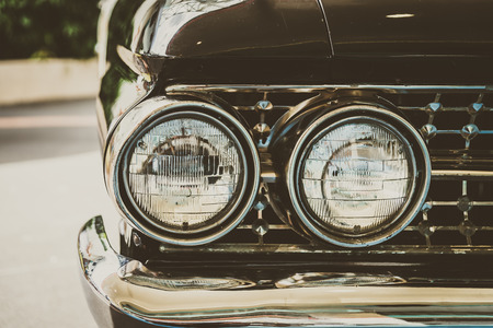 Headlight lamp  vintage car - vintage filter effectの写真素材