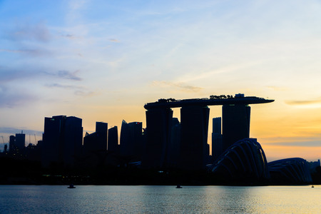 silhouette Singapore city with sunset timesのeditorial素材