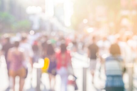 Blur people at orchard road in singapore - sunflare effect filterの写真素材