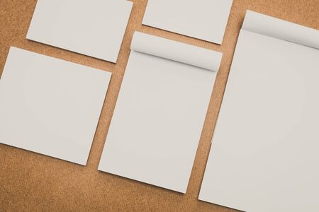 White paper mock up on wood background - vintage filterの写真素材