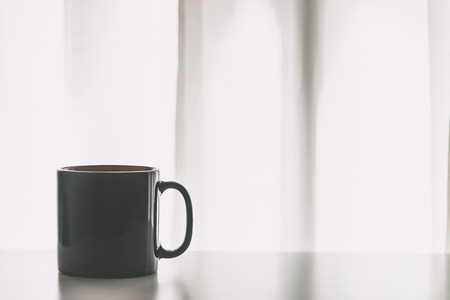 Selective focus on Black Coffee cup - vintage soft filterの写真素材