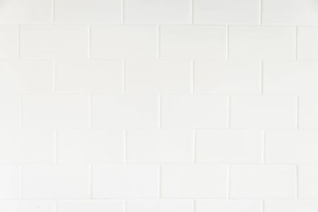White tiles wall textures backgroundの写真素材