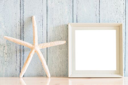 Vintage wood Blank photo frame with summer concept designの写真素材