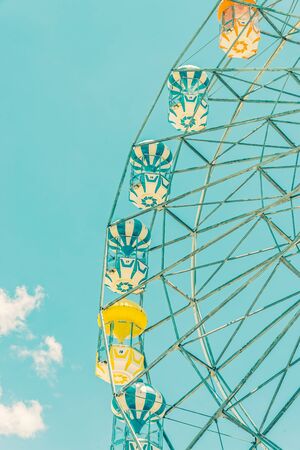 Vintage ferris wheel in the park - vintage filter effectの写真素材