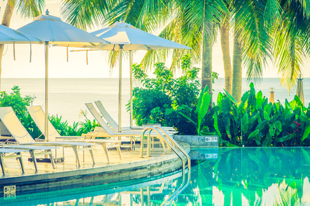 Beautiful luxury hotel pool resort neary beach - Vintage filter effect processingのeditorial素材