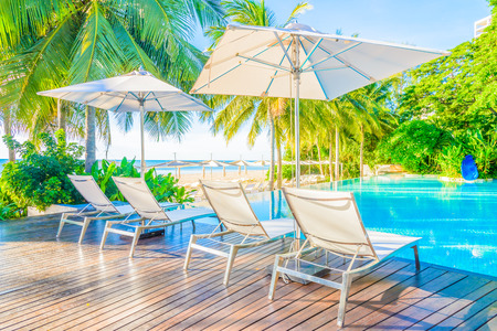 Beautiful luxury hotel pool resort nearly beach - Bright light processing styleのeditorial素材