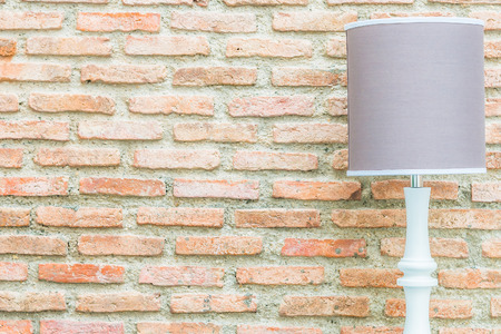 Light lamp with copy space on brick wall backgroundの写真素材