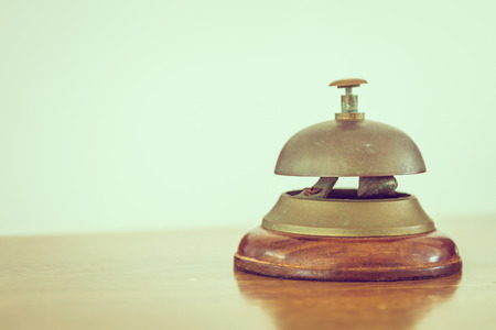 Vintage service bell at hotel reception - vintage filterの写真素材