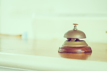 Vintage service bell at hotel reception - vintage filterの写真素材