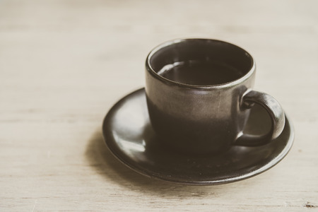 Black coffee cup - vintage filter effectの写真素材