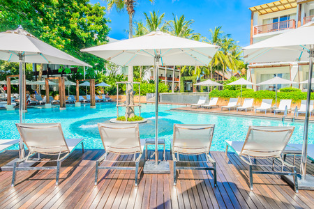 Umbrella with chair in hotel  swimming pool resortのeditorial素材