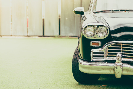 Vintage headlight lamp on vintage classic car - vintage filter effectのeditorial素材
