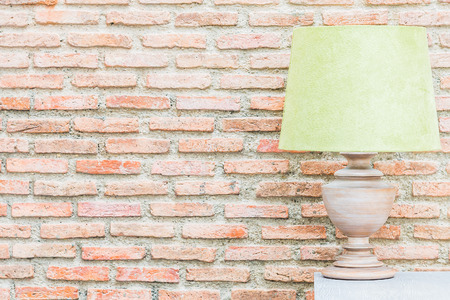 Light lamp with copy space on brick wall backgroundの写真素材