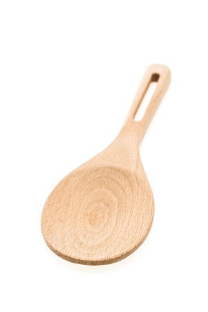 Wooden rice spoon isolated on white backgroundの写真素材