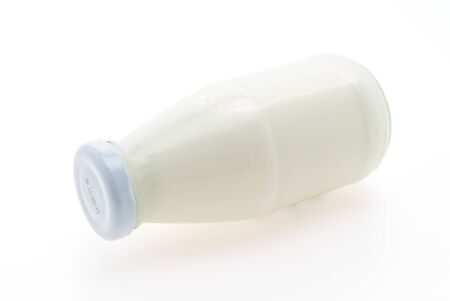 Milk bottle glass isolated on white backgroundの写真素材