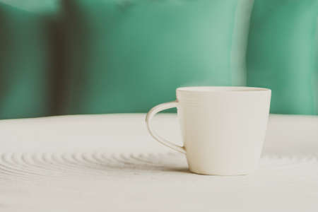 Selective focus point on black coffee in white cup - vintage filter effectの写真素材