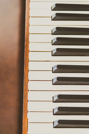 Selective focus point on Old vintage piano keys - vintage filter effectの写真素材