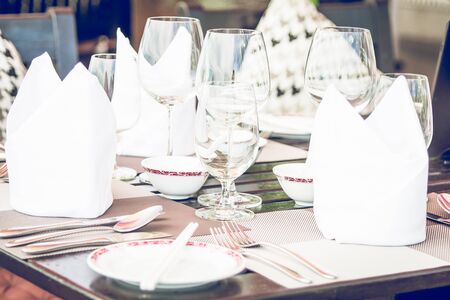 Table dining set in the hotel restaurant - light vintage filter effect processing style pictures -...