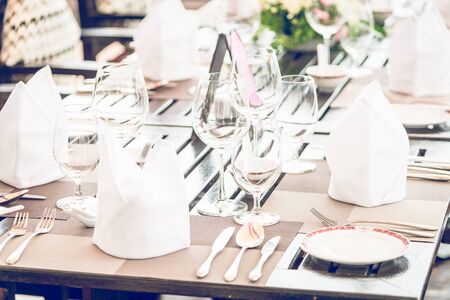 Table dining set in the hotel restaurant - light vintage filter effect processing style pictures -...