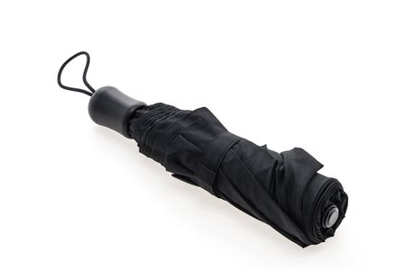 Black umbrella isolated on white backgroundの写真素材