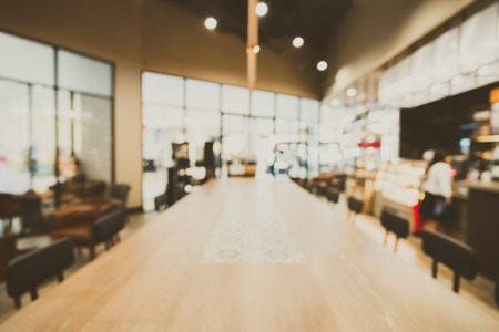 Abstract blur coffee shop cafe interior background - vintage filterの写真素材