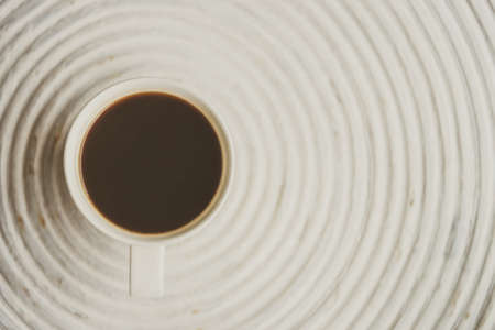 Selective focus point on black coffee in white cup - vintage filter effectの写真素材