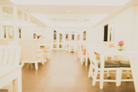 Abstract blur interior restaurant background - vintage light filter effectの写真素材
