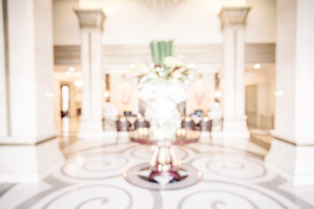 Abstract blur hotel lobby interior for background - vintage filter effectの写真素材
