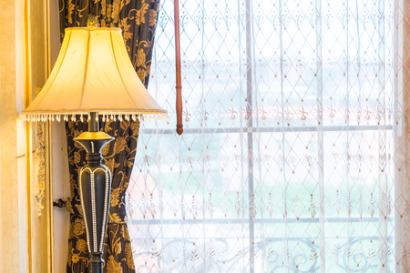 Classic Sofa pillow with light lamp decoration living room interiorの写真素材