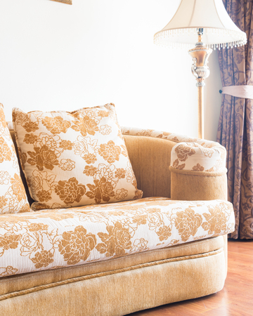 Pillow on sofa with light lamp decoration of living room interiorの写真素材
