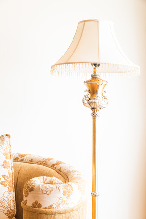 Pillow on sofa with light lamp decoration of living room interiorの写真素材