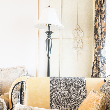 Classic Sofa pillow with light lamp decoration living room interiorの写真素材