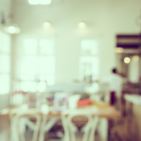 Abstract blur coffee shop cafe interior background - vintage filterの写真素材