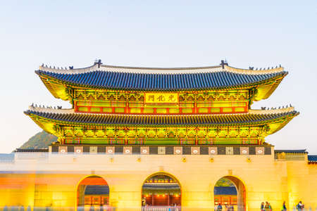 Beautiful Architecture in Gyeongbokgung Palace at Seoul city Korea at Twilight time with night light from traffic carのeditorial素材