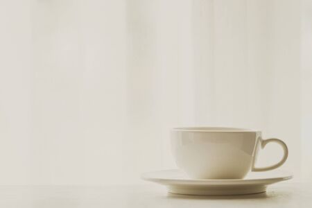 White Coffee cup - vintage filter effectの写真素材