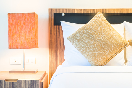 Pillow bed in luxury hotel bedroomの写真素材