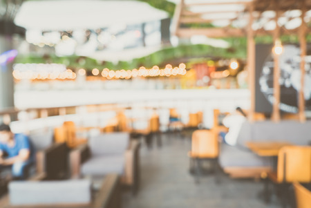 Abstract blur coffee shop interior background - vintage filterの写真素材