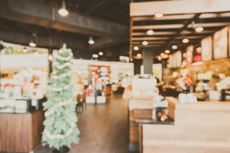 Abstract blur coffee shop interior background - vintage filterの写真素材