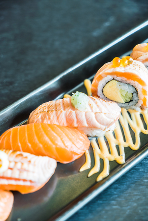 Soft focus on Salmon sushi roll (Japanese food style) - HDR Merge 3 Photos Processingの写真素材