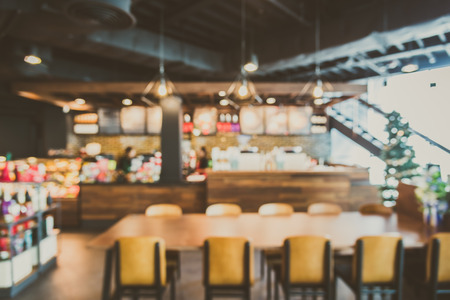 Abstract blur coffee shop interior background - vintage filterの写真素材