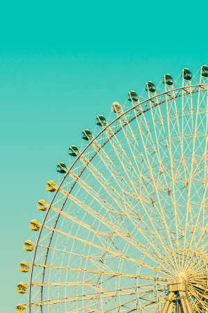 Vintage ferris wheel in the park at Japan - Vintage filter effectの写真素材