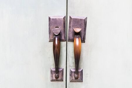 Old Door handles decoration exterior of homeの写真素材