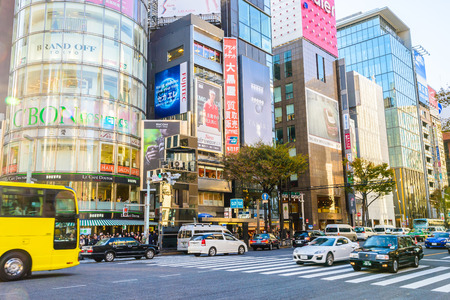 TOKYO - November 28, 2015: The Ginza District November 28, 2015 in Tokyo, Japan. Ginza extends for 2.4 km and is one of the world's best known shopping road districts.のeditorial素材