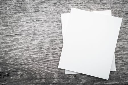 Blank white mock up book on wooden background - filter effect processing