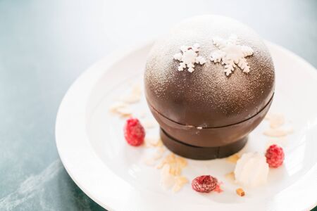 Chocolate christmas ball dessert - Soft focus pointの写真素材
