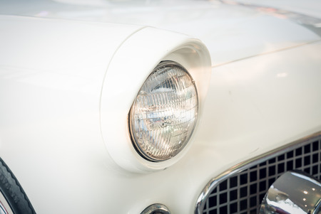 Selective focus point on Headlight lamp car - vintage filter