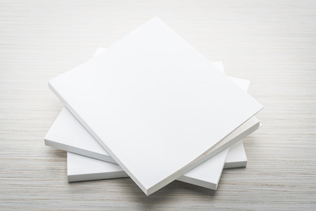 Blank white mock up book on wooden background - filter effect processing